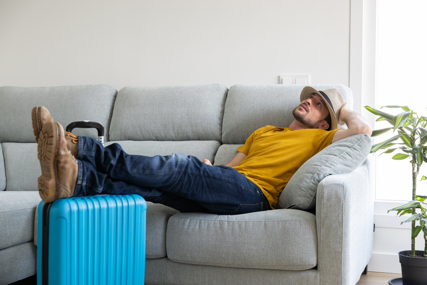 Man resting in the living room of their house until it's time to